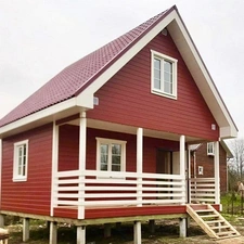 Проект компактного дачного дома с мансардой: 63 метра для загородного отдыха